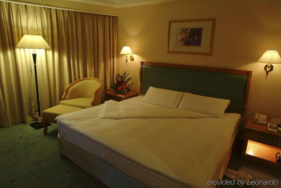 Celebrity International Grand Hotel Peking Zimmer foto